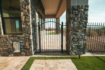 Mesa backyard with fire pit and desert landscaping