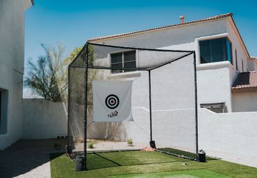 Outdoor living with shade pergola and sports court in Arizona