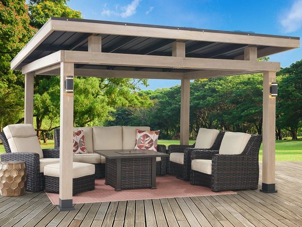 Outdoor patio set with canopy and wicker furniture.