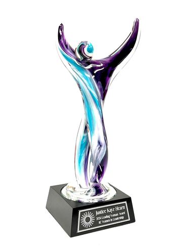 sculpted glass figure award on wood base with plaque