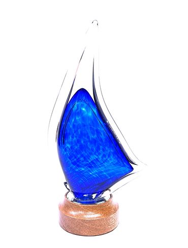 blue blown glass flame shaped award on wood base