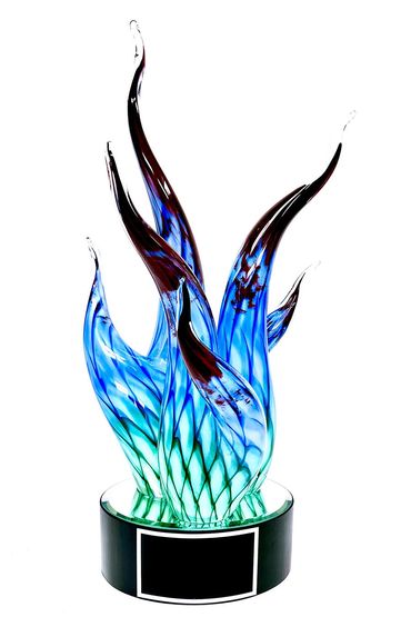 organic shape blown glass flame award on oval wood base with plaque