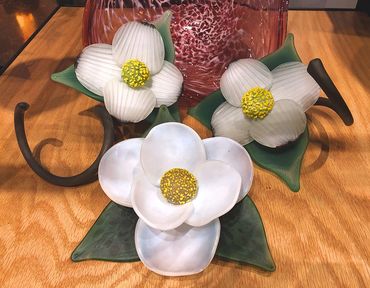 blown and sculpted glass magnolia and dogwood flowers