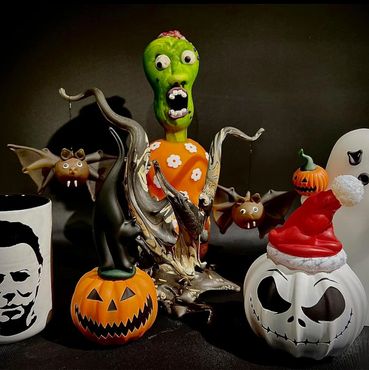 blown glass halloween bats, trees, ghosts, zombies, pumpkins, and cups