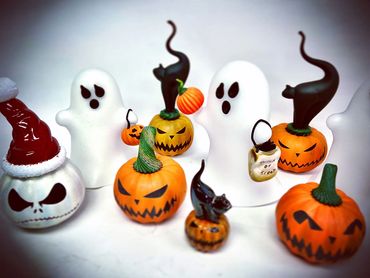 blown glass ghosts cats and pumpkins