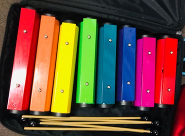 Colourful xylophone chime bars used in Music Therapy