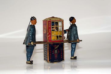 antique toy appraisal, buying antique toys, toy appraiser, lehmann mandarin german wind up tin toy,