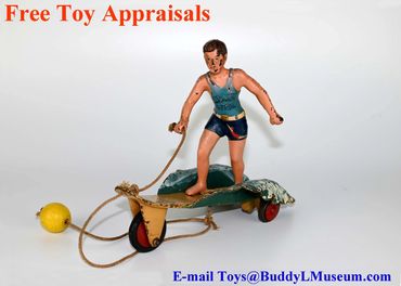 toy appraisals, buying cast iron toys, hubley beach patrol, hubley surfer boy, hubley surfer girl