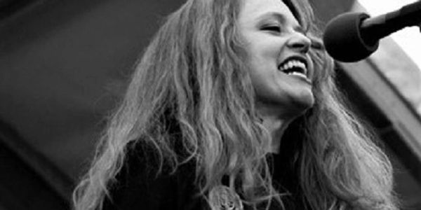 Woman with mic.