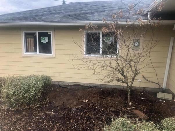 Full home remodel on exterior. New windows, siding, doors, garage...