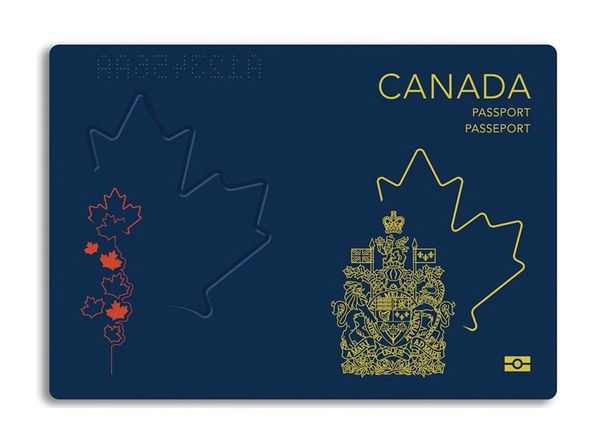 Canadian passport cover with embossed maple leaf and gold emblem.