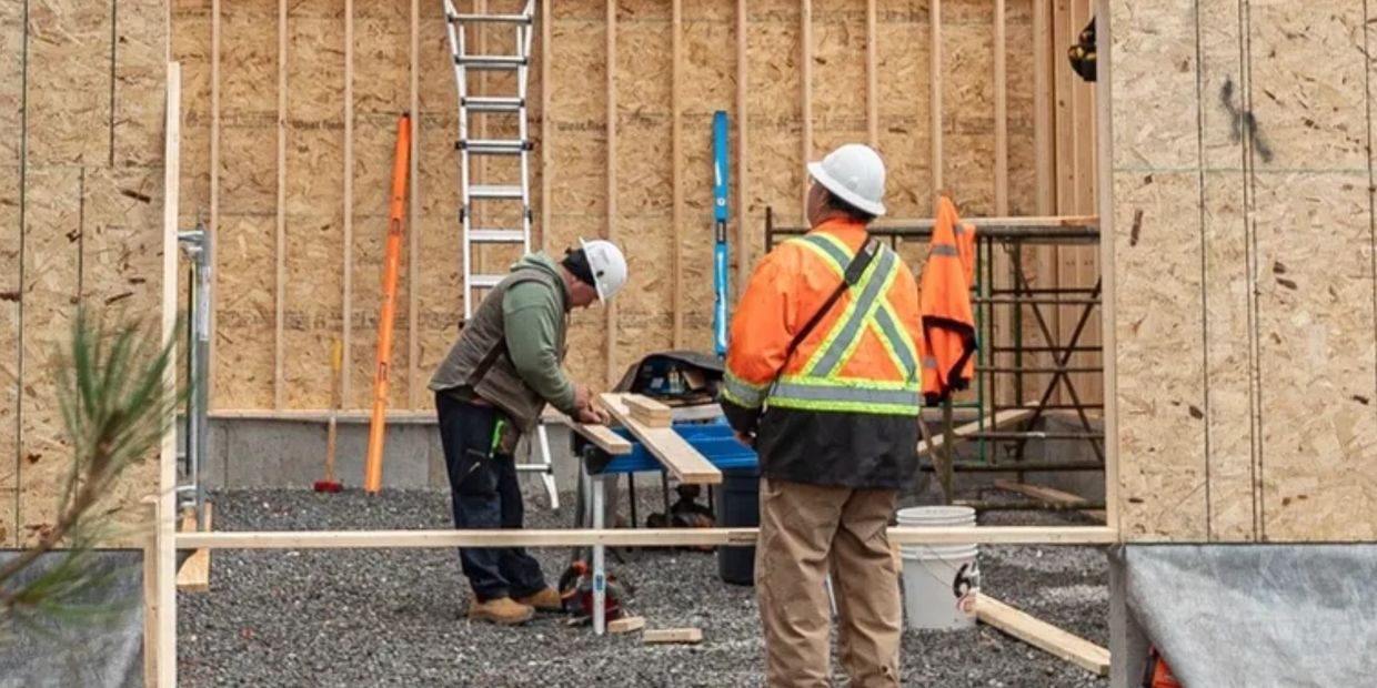 Construction workers building a garage in Kingston, Ontario