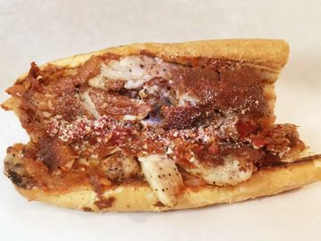 An open sandwich with meat