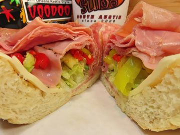 Sandwich halves with slices of meat