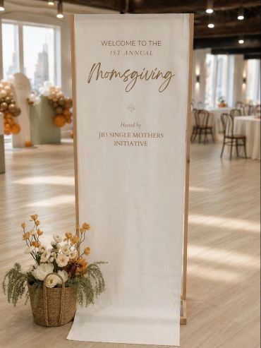 Elegant welcome sign for the 1st Annual Momsgiving event.