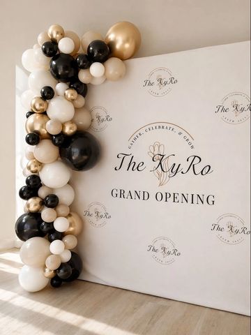Elegant black, white, and gold balloon decoration for The KyRo grand opening.