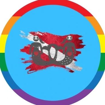 Adventure Mermaid logo, two graphic mermaids in front of a SCUBA diver down flag with rainbow frame