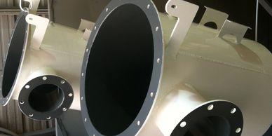 Powder coated outside with wear resistant coating on the inside.  