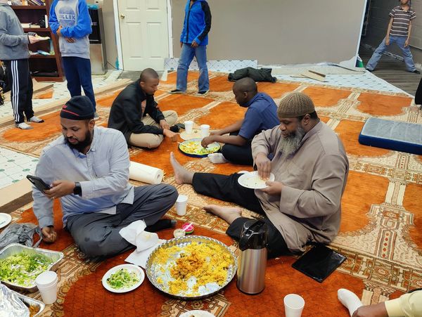 Brothers eating together