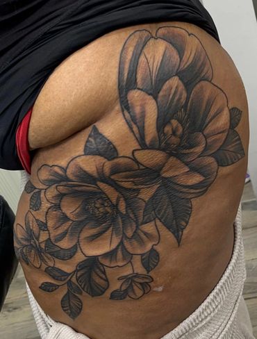 Floral hip tattoo