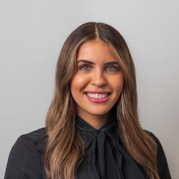 corporate headshot photo of young female professional