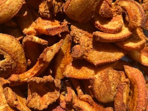 Close-up of crispy fried pork rinds with a golden-brown texture.