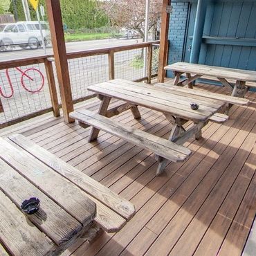 Spacious bar area at Greeley Avenue Bar & Grill in North Portland with craft beers and cocktails