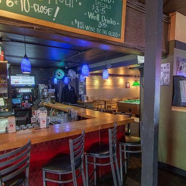 Pool table and TV area at Greeley Avenue Bar Shipyard neighborhood Portland