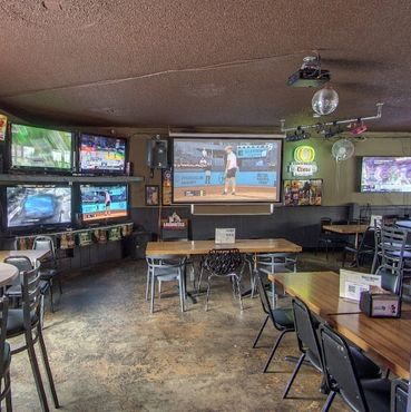Fans enjoying sports at Greeley Avenue Bar & Grill Shipyard neighborhood