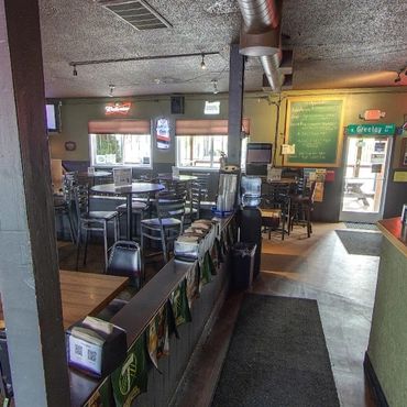 Sports fans celebrating a win at Greeley Avenue Bar North Portland