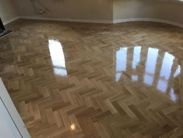 The finished parquet flooring, using a 3 coat lacquer system