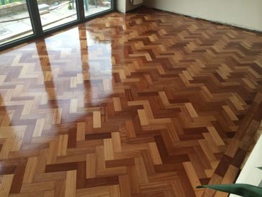 The finished sand and seal flooring using reclaimed mahogany wood