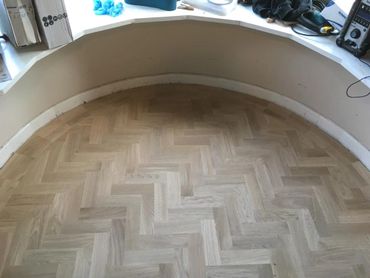 We can install parquet to perfectly fit the contours of your room