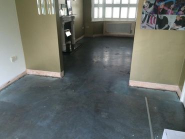 Preparing the ground ready for the herringbone flooring installation