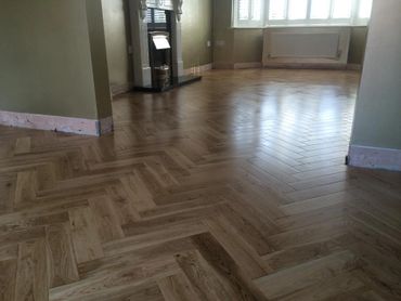Another angle of the herringbone parquet flooring we completed in Rhyl