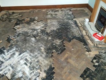 The preparation stage of the wooden block parquet floor we completed in Cheshire