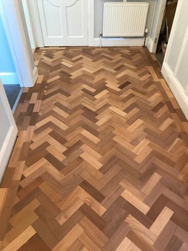 Another angle of the completed sanding of the reclaimed wood parquet floor
