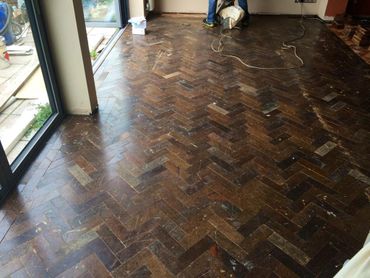 The finished installation of a reclaimed hardwood floor. The next stage is to sand, seal and lacquer