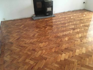 Another angle of the finished installation of a reclaimed pitch pine parquet block floor