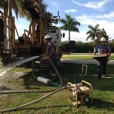 Pumping out a Deep Well and measuring gallons per minute in Palm Bay and Melbourne Florida