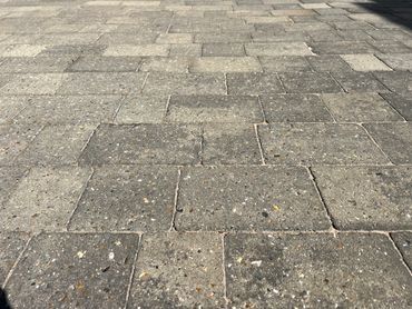 clean driveway, with new sand in between blocks