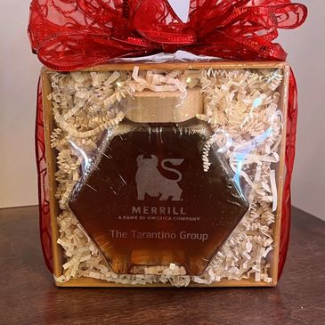 boxed honey gift with red ribbon