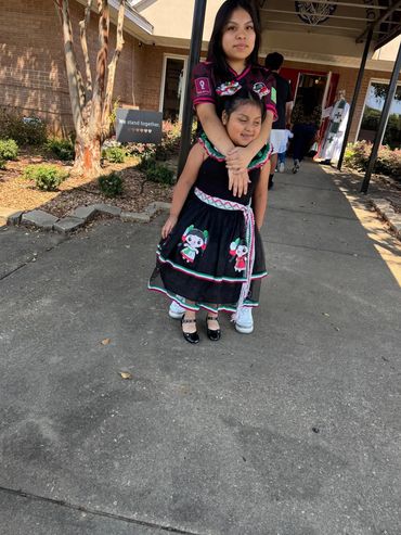 Two of our young Latina children,