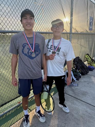 Two SCHP Tennis players with medals after a tournament match