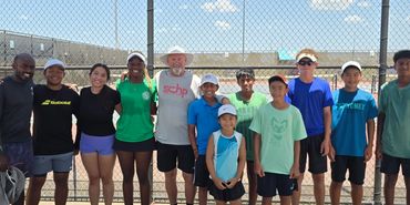 SCHP Tennis players and coaches group photo on court in Georgetown, TX