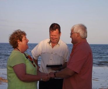 A relaxed alternate service on the beach with the rising sun