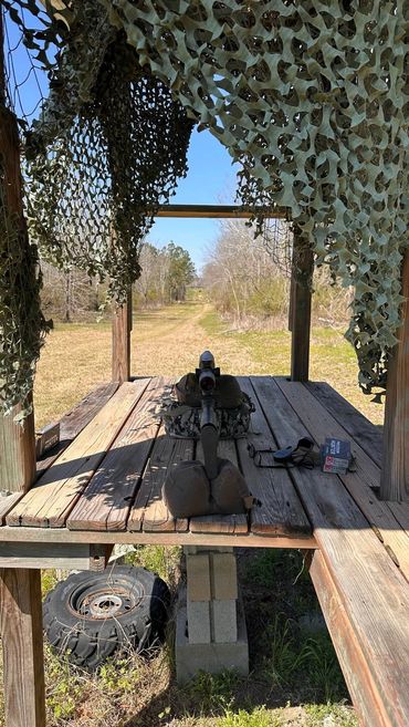 View down the shooting lane from under camo netting