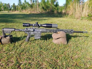 My hunting rifle on the grass