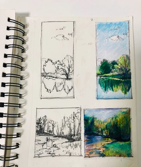 Sketchbook pages with black and colored landscape drawings.