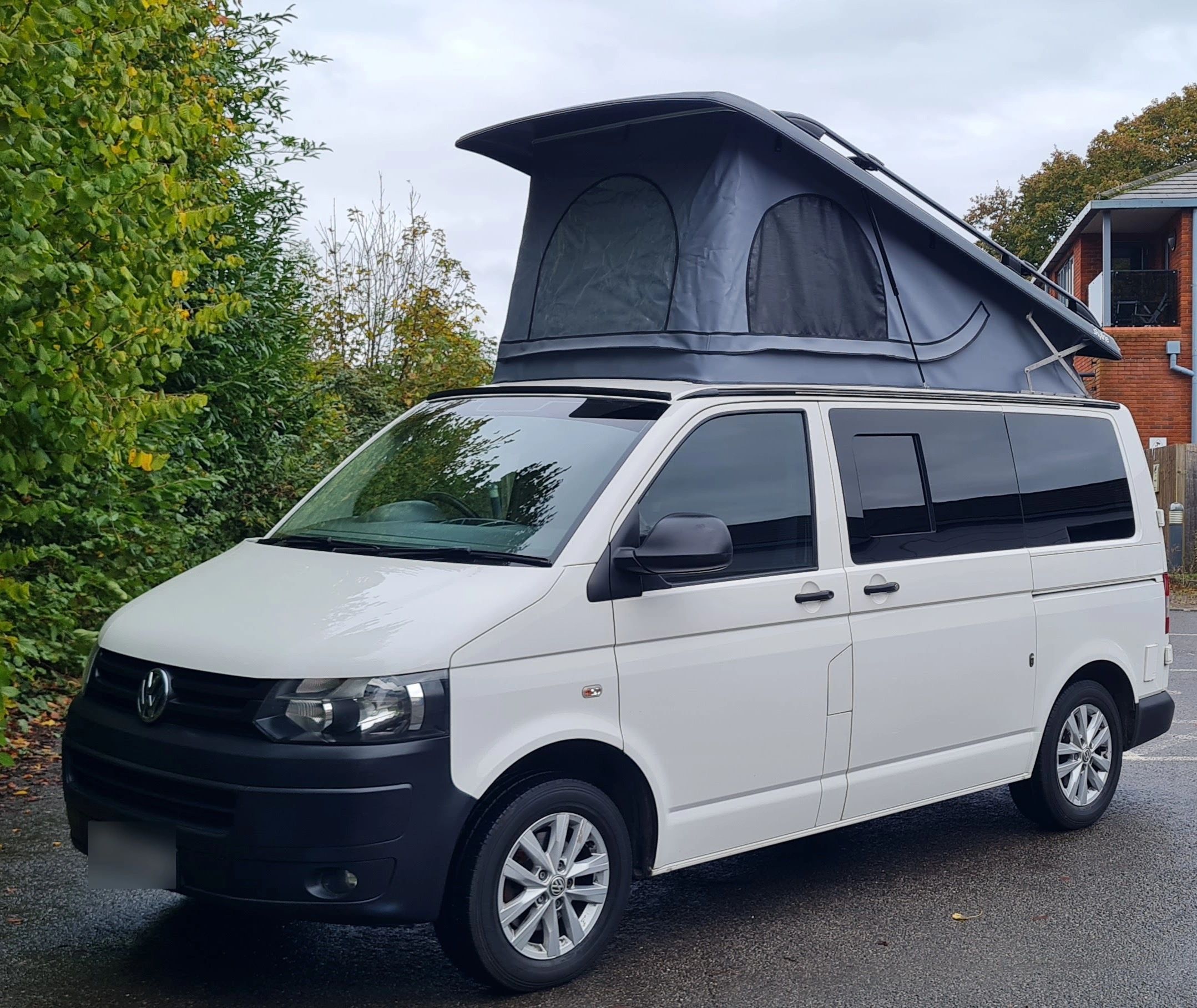 VW T5 with Skyline pop top raised, fitted by Sharkbite Conversions